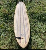Longboard surfboard on grass with Rad Wax